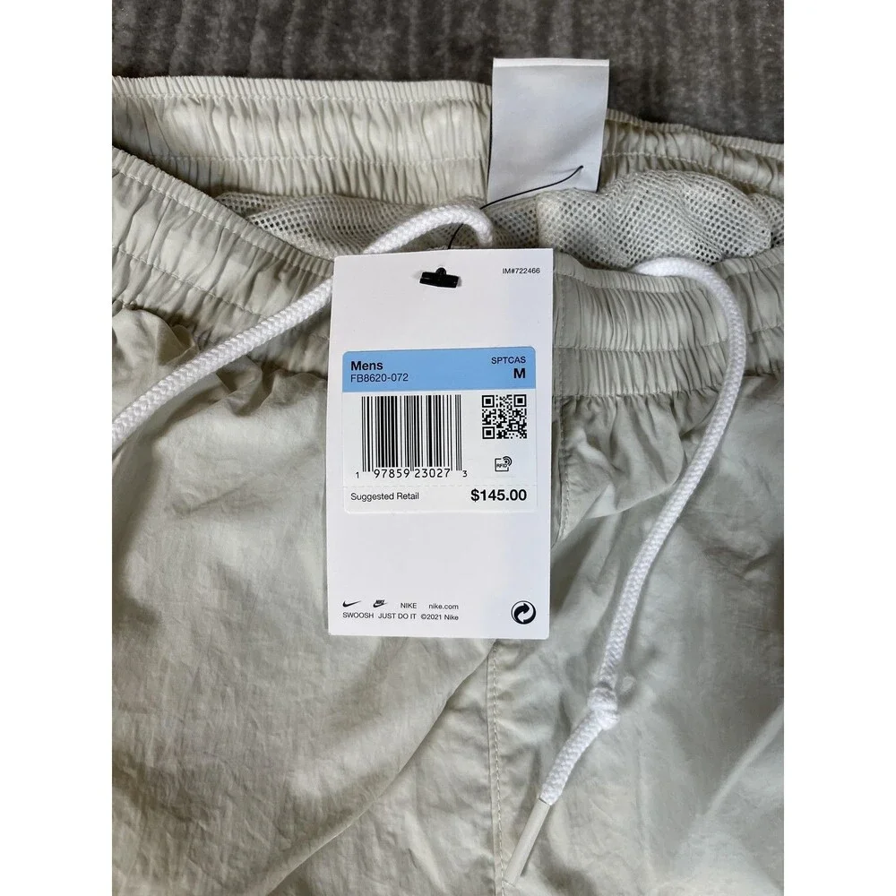 Nike Track Pants Mens Medium White Solo Swoosh Loose Fit Taper Leg Stacked New